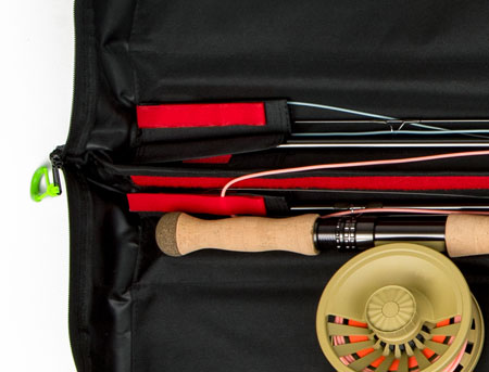 Hook and loop straps secure fly line and sleeves hold rod sections