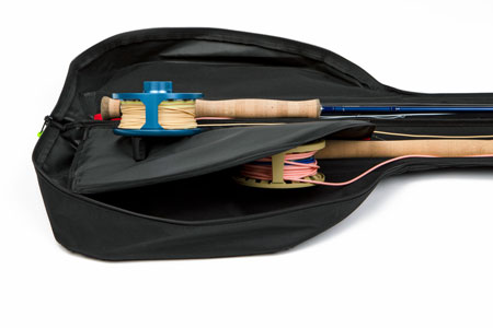 Padded divider protects fly reels